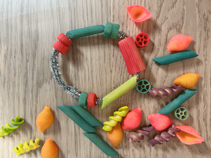 A dyed pasta bracelet for preschool mother's day crafts